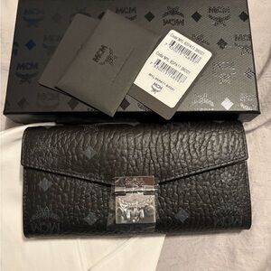 MCM Black Textured Leather Clutch